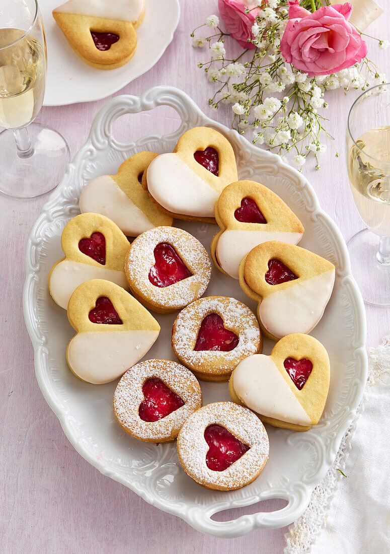 Heart-shaped wedding biscuits with raspberry jam