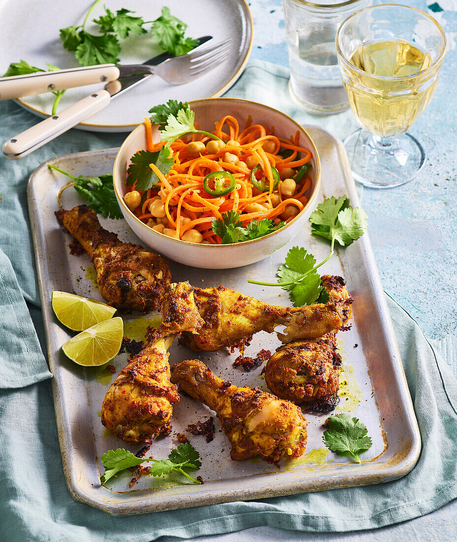 Roasted chicken drumsticks with carrot and chickpea salad