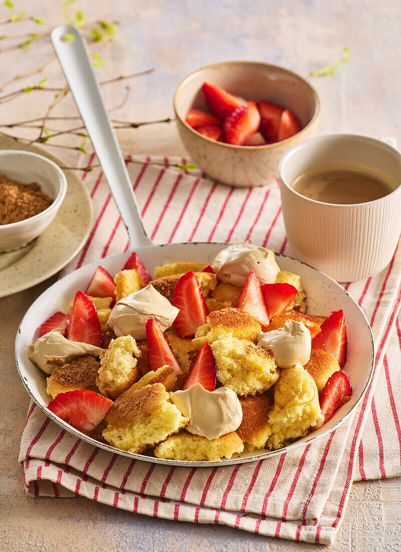 Kaiserschmarrn with coffee cream and strawberries