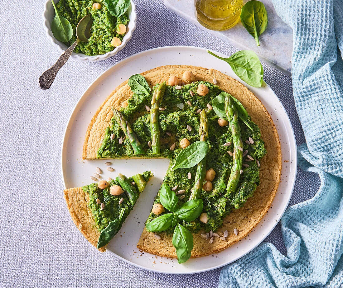 Savoury chickpea tart with asparagus and spinach