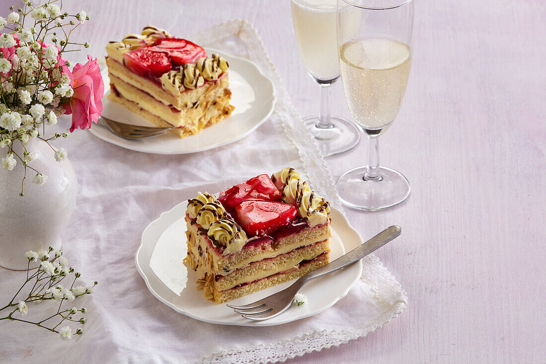 Strawberry tartlets with custard and chocolate icing