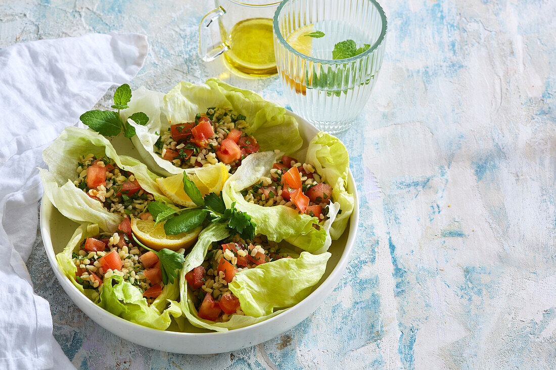 Tabbouleh salad served in lettuce leaves