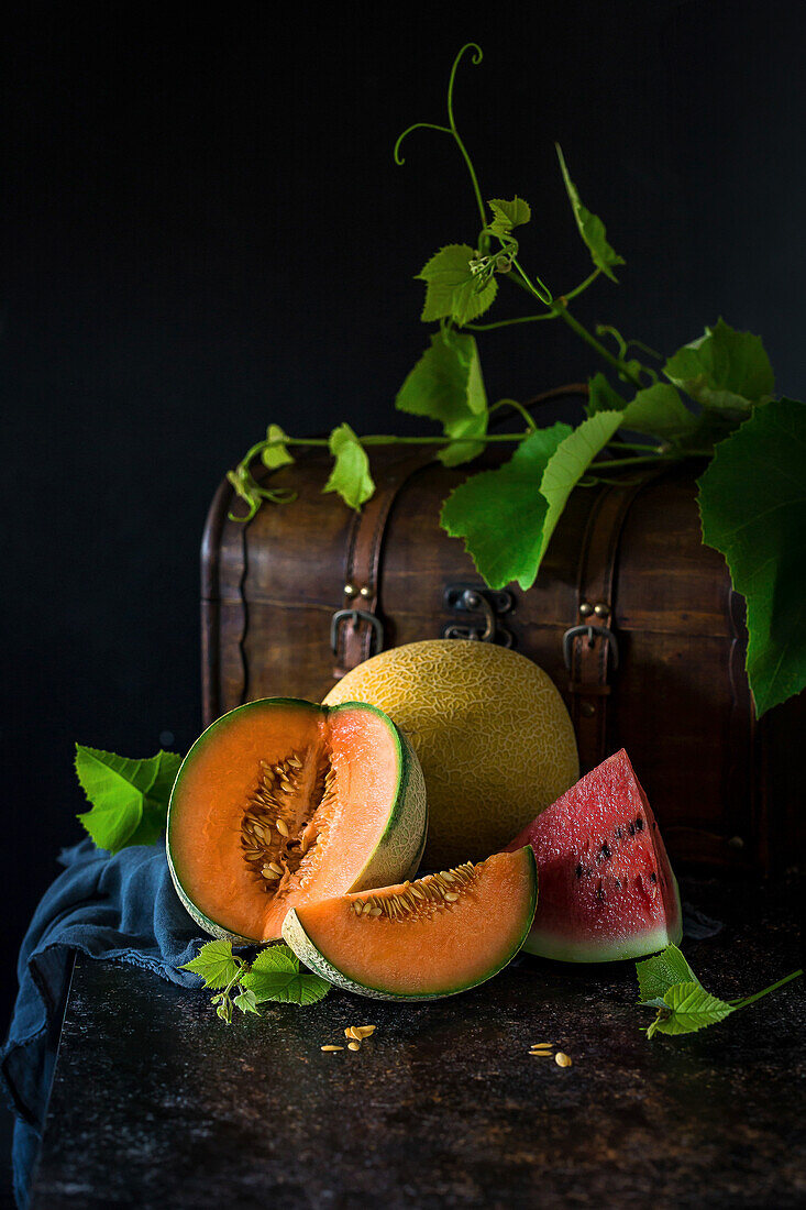 Still life with sliced cantaloupe, honeydew melon and watermelon