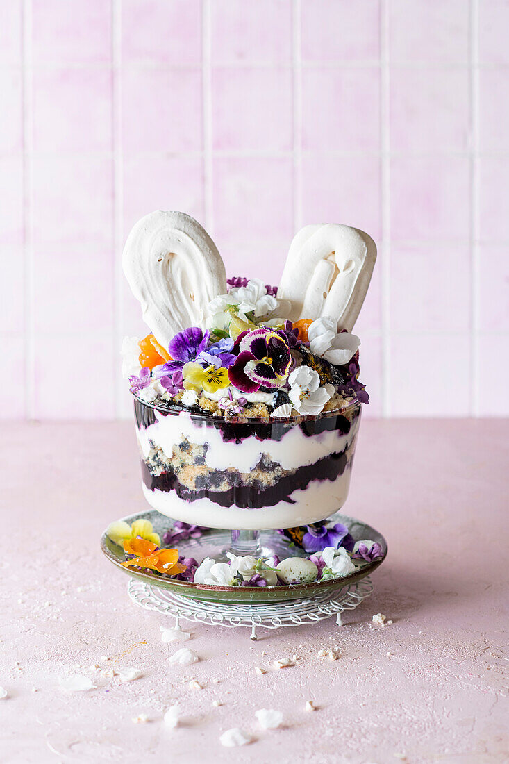 Easter trifle with edible flowers and meringue ears