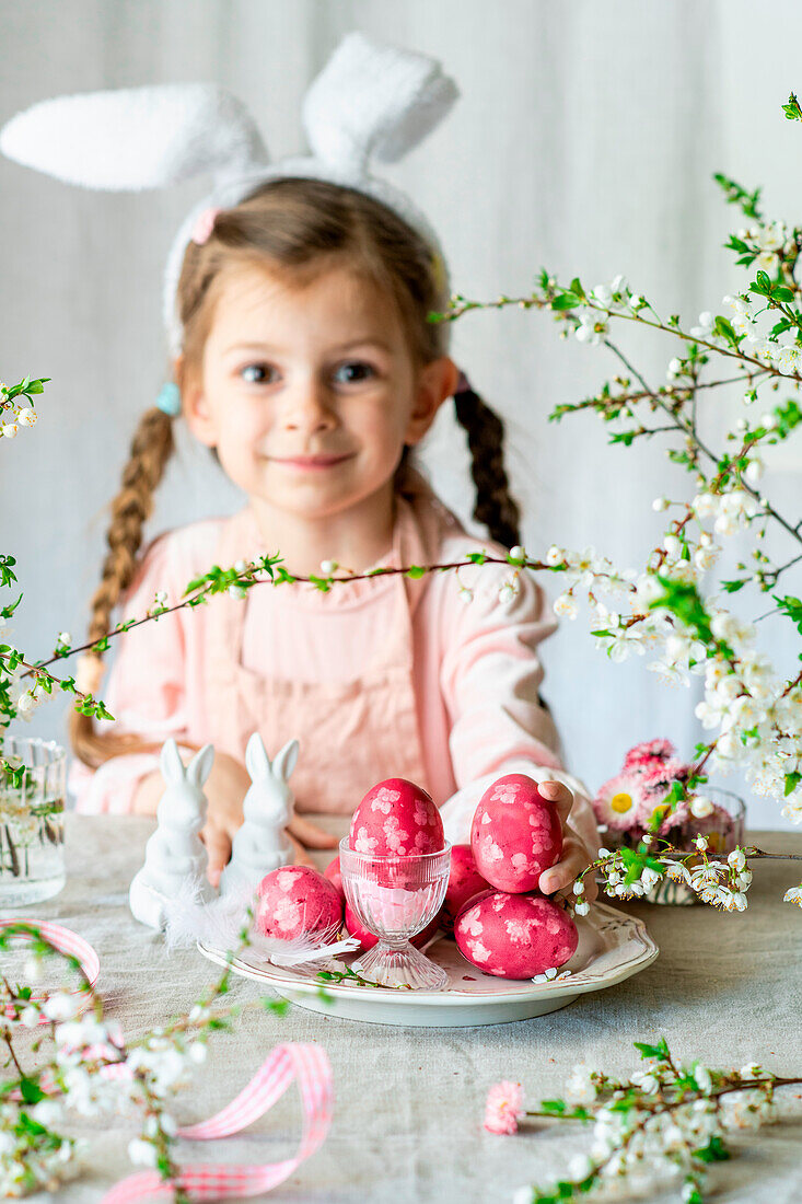 Easter colored eggs with dried flowers