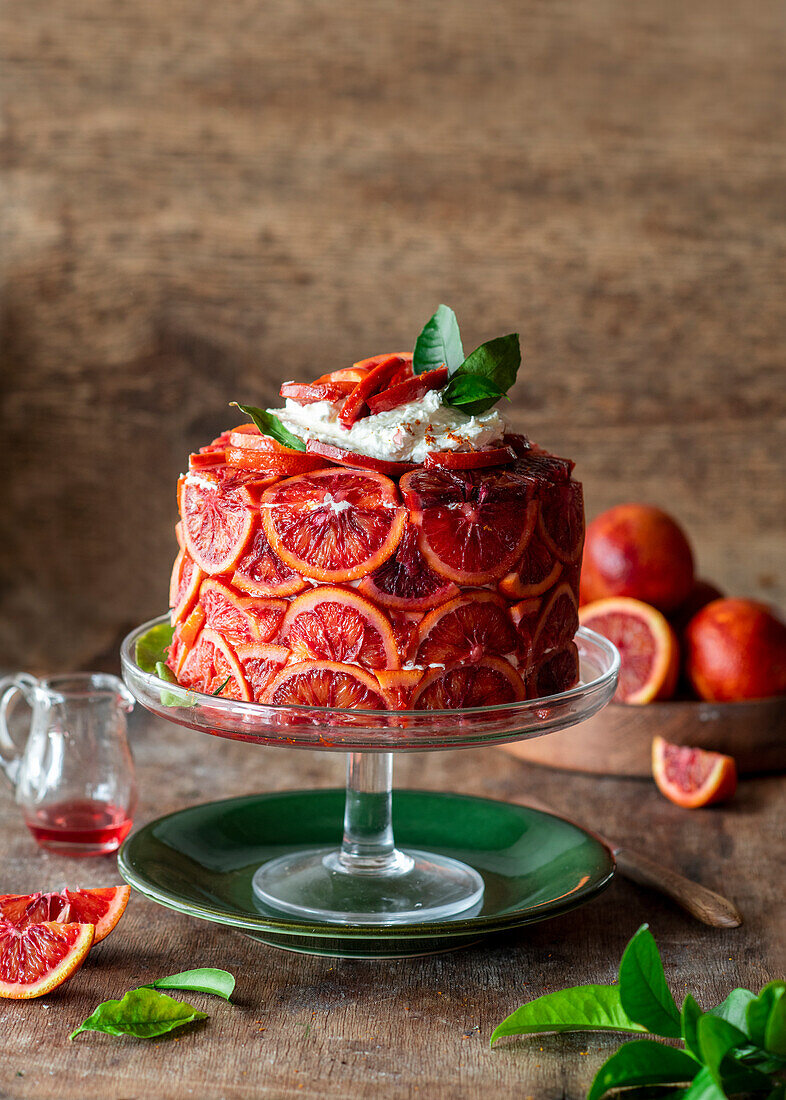 Blood orange cake with buttercream and fresh blood oranges