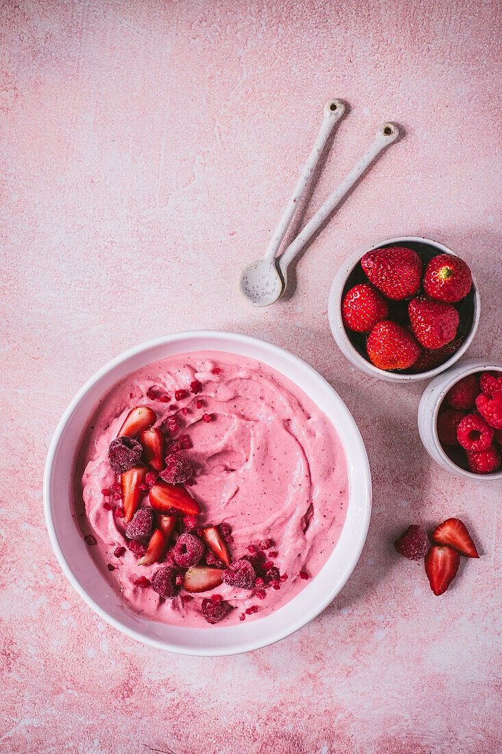 Grainy cream cheese with strawberries and raspberries