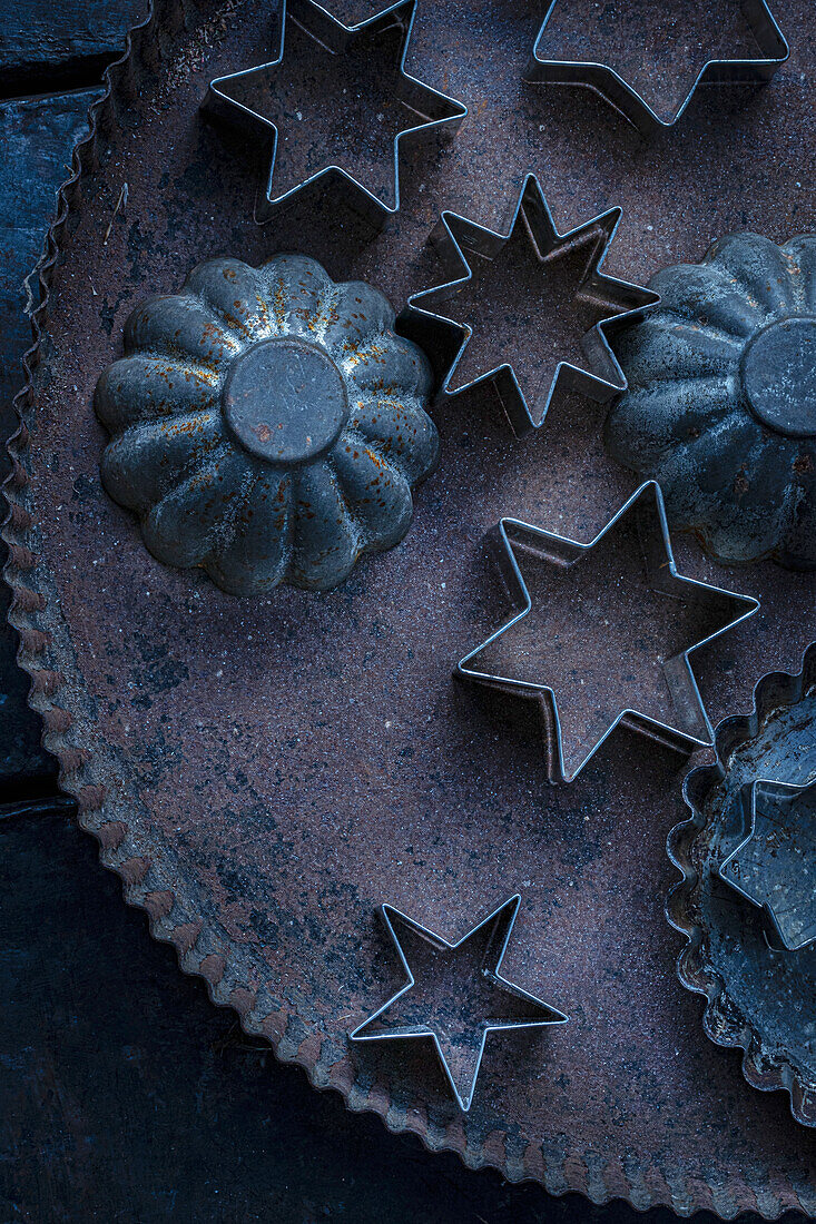 Old cookie tins on a baking tray