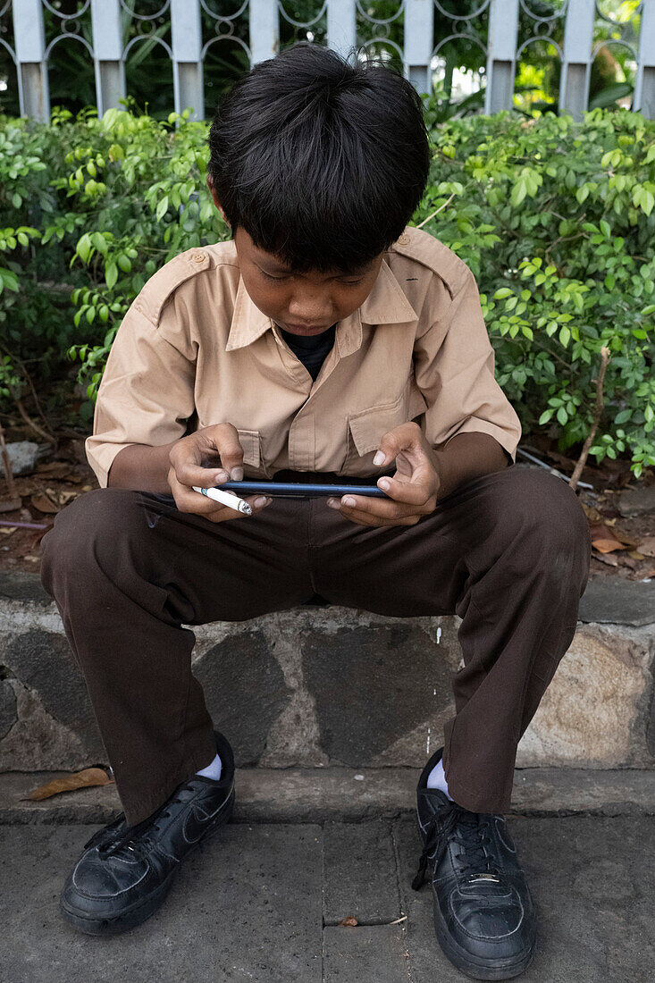 Young boy smoking