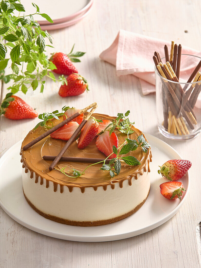 Caramel cheesecake with chocolate biscuit sticks + steps