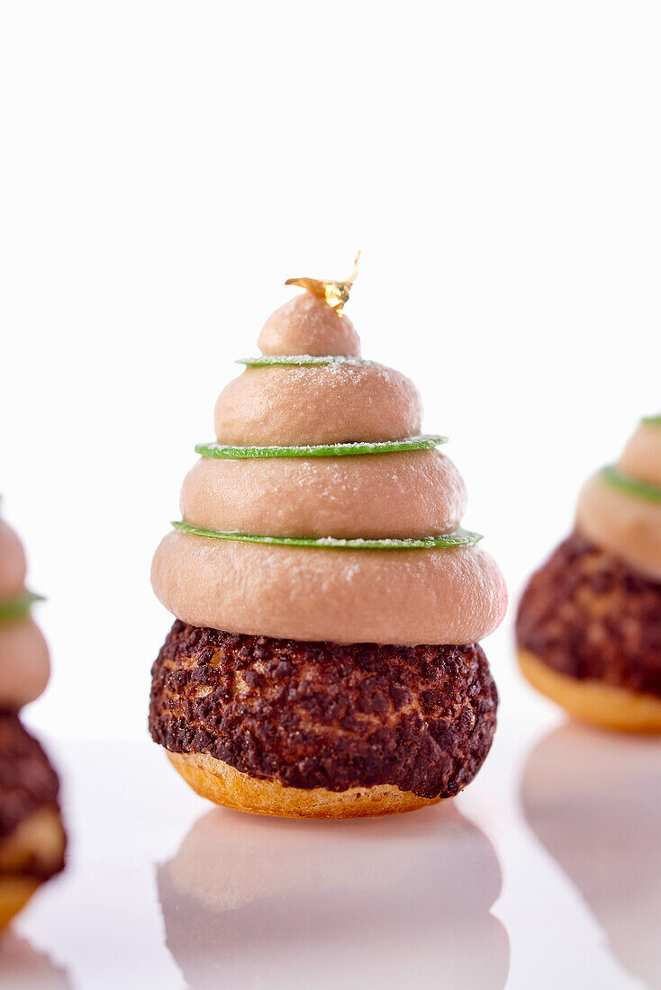 Choux with chocolate filling and hazelnut mousse