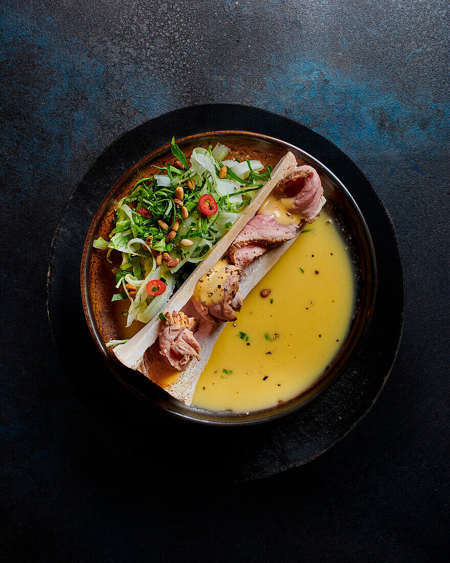 Veal tataki with celery and pine nuts