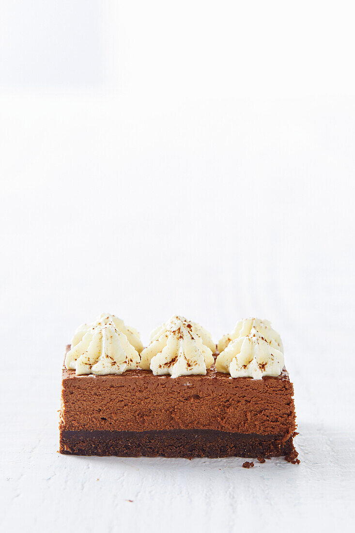 Chocolate mousse cake with Baileys and whipped cream topping