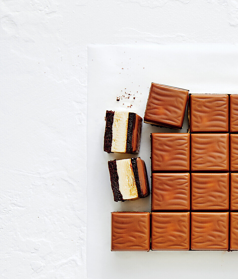 Mint cheesecake cubes with chocolate icing