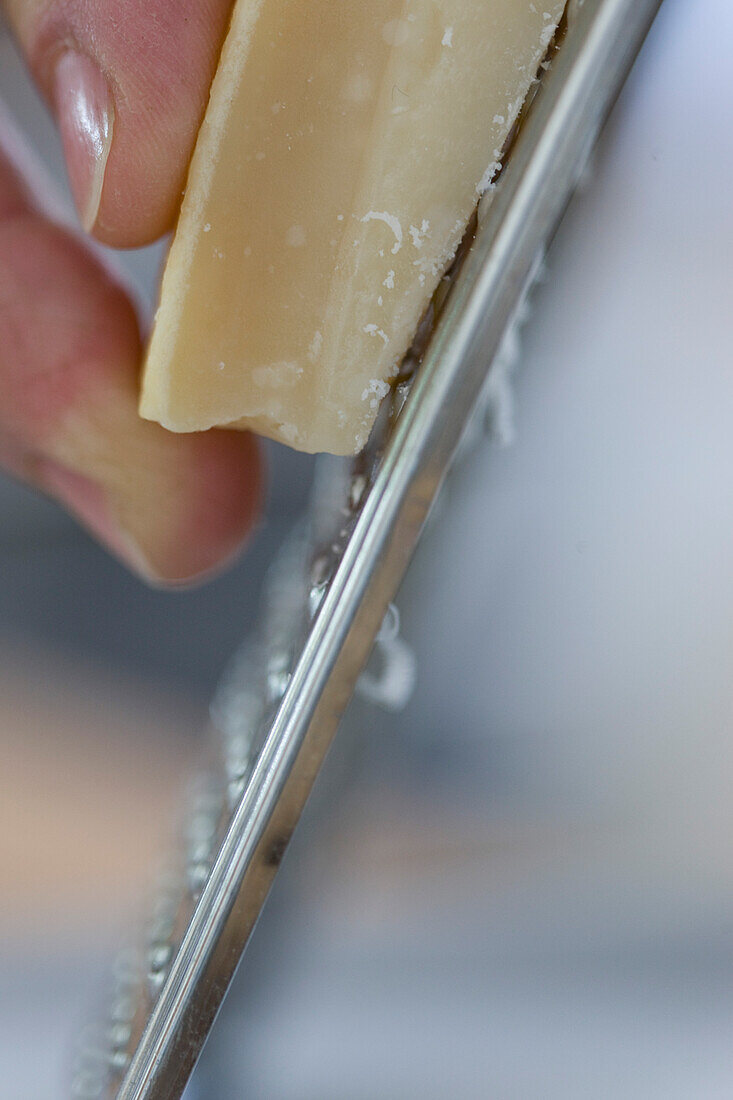 Close up of Grating parmesan cheese