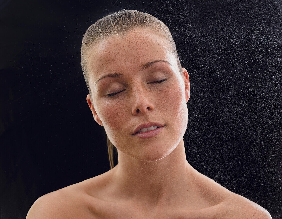 Beauty Water Spraying on Woman Face