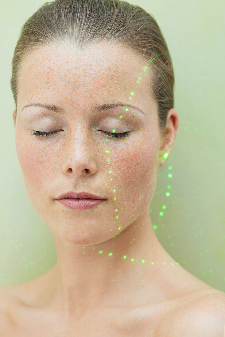 Beauty Portrait of Woman with Laser beam on Face