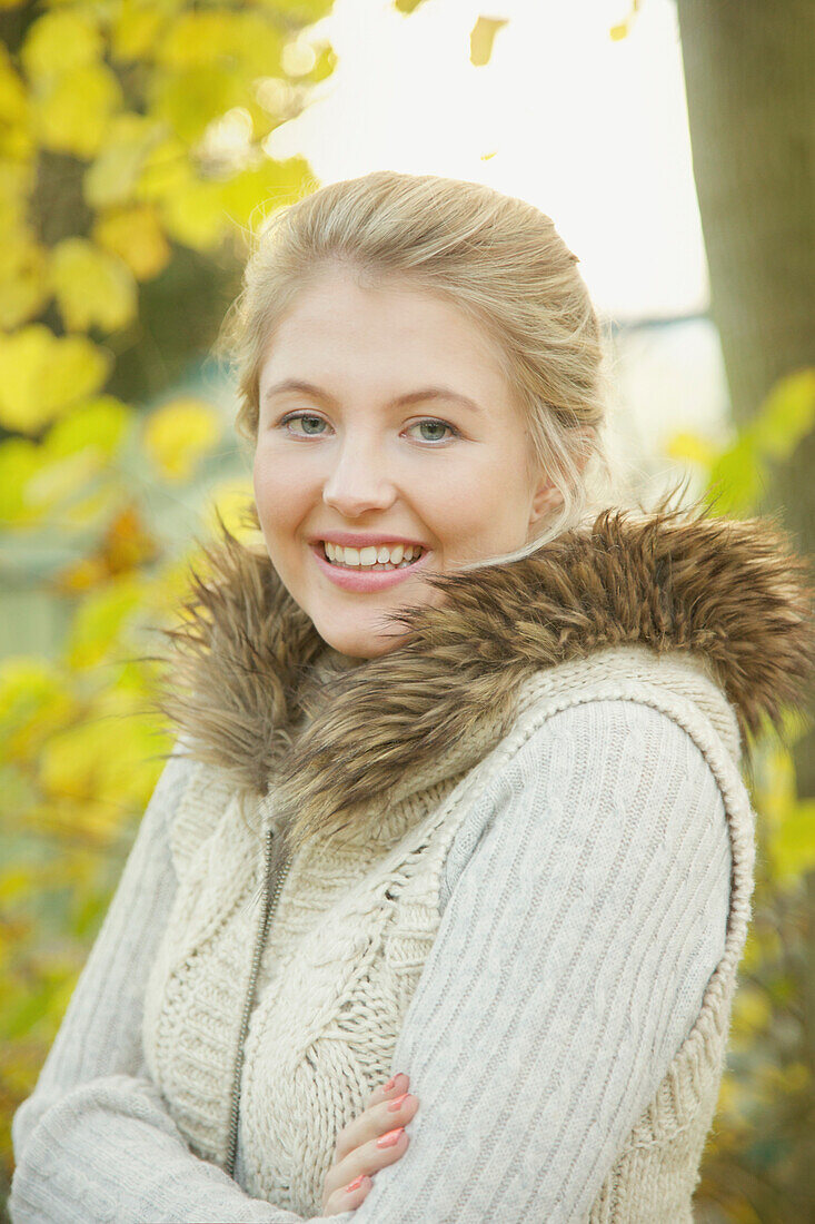 Portrait of Young Woman Outdoors Smiling