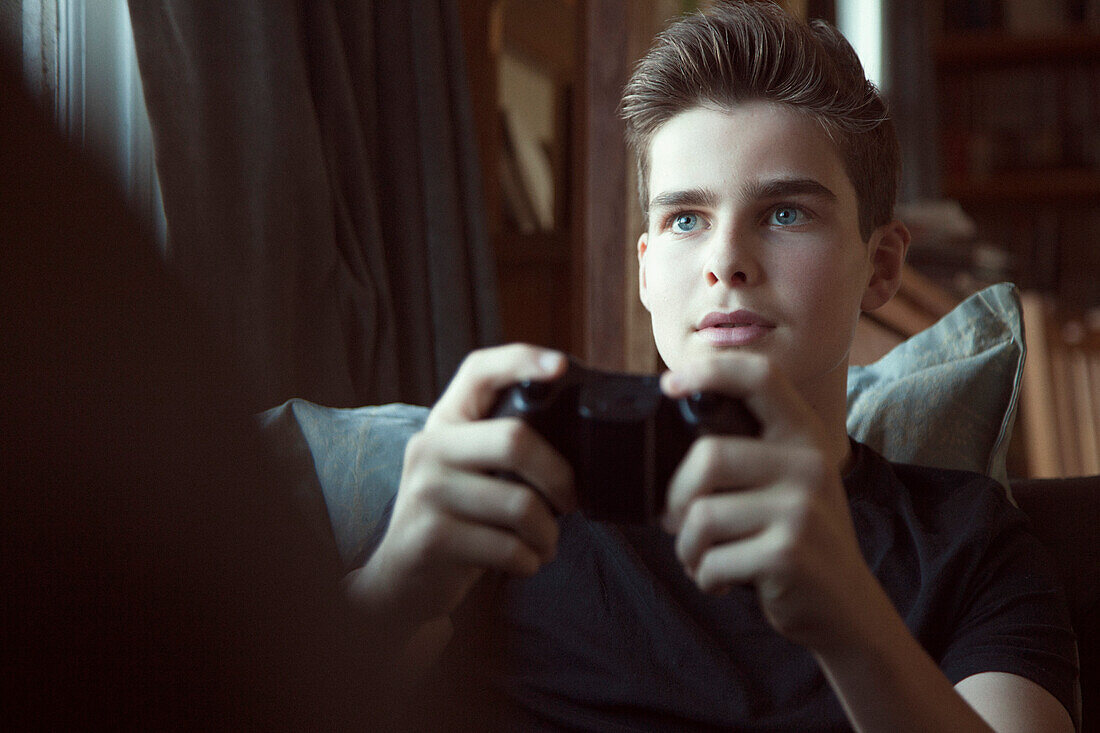 Teenage Boy Playing Video Game