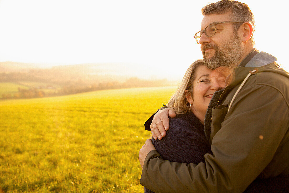 Couple Hugging in a Field