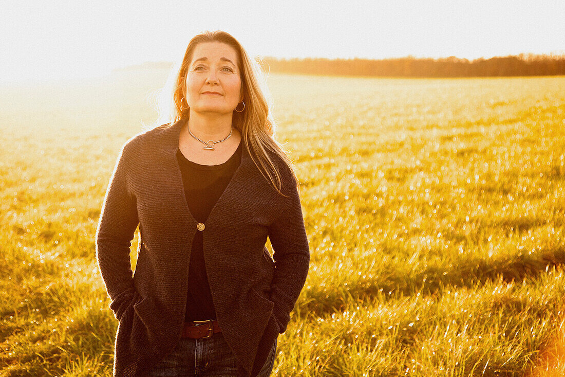 Woman Standing in a Field