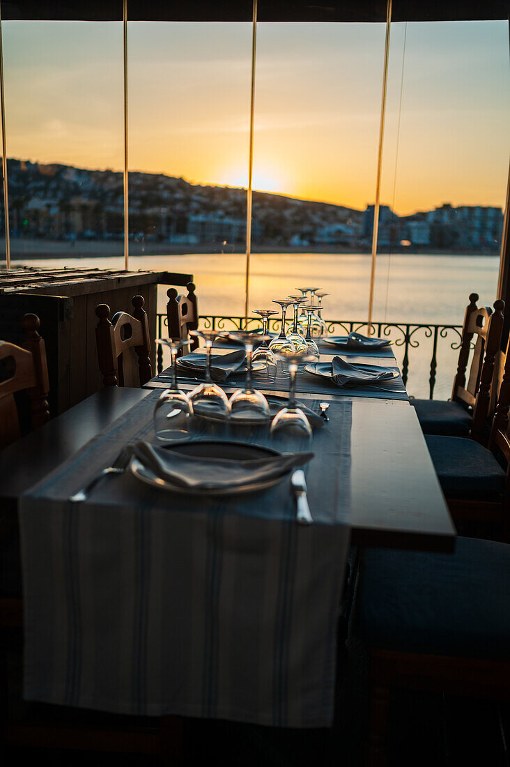 Coastal restaurant at sunset in Peñiscola, Castellon, Valencian Community, Spain