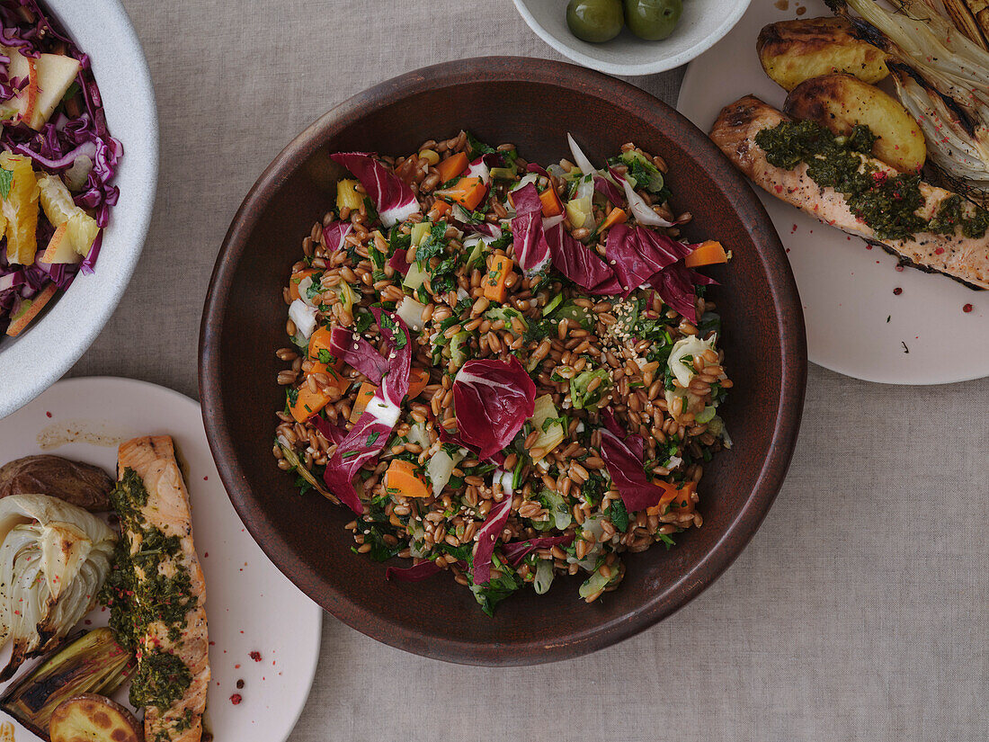 Still life view from above healthy spelt salad with radicchio and vegetables