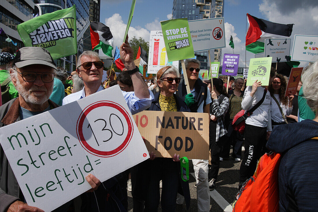 Environmental activists gather during march protest at the Zuidas financial district on May 31, 2024 in Amsterdam,Netherlands. Thousands of the environmental activists and supporters make a demonstration against the lobby of the large companies, their influence on politics, climate and ecological crisis and this consequences and demand a citizen's assembly for a just climate policy.