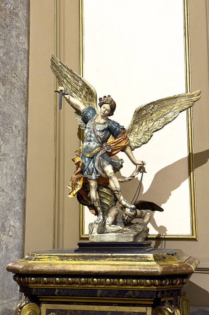 Statue of Michael the Archangel defeating the devil in the Metropolitan Cathedral, Buenos Aires, Argentina.