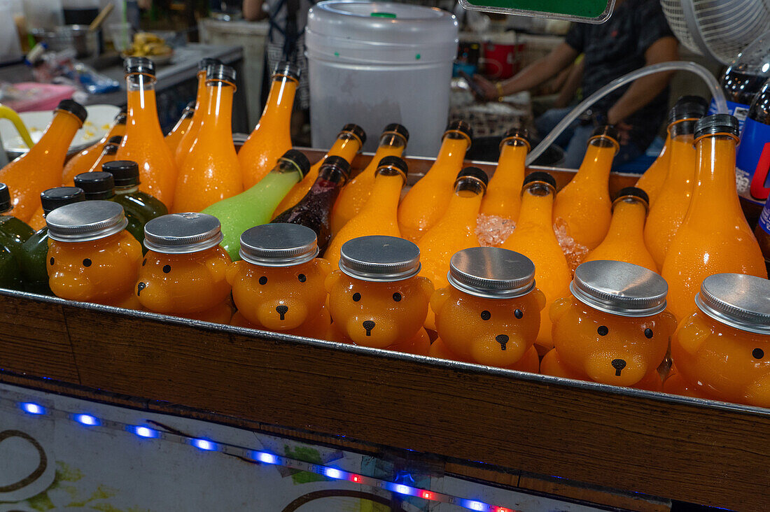 Tropical fruit juices for sale at a market stall, Chiang Mai, Thailand, Southeast Asia, Asia