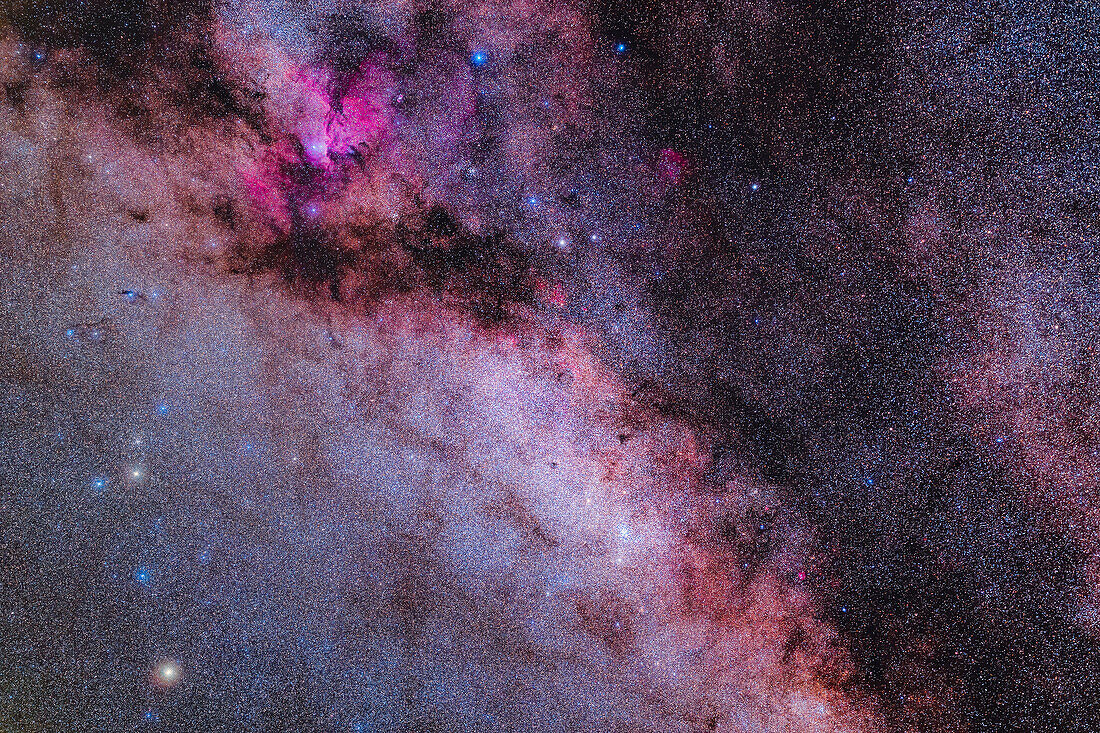 This frames the rich region of the southern Milky Way in the small constellations of Norma (at centre) and Ara (at left and extending to the top). The bright Norma Starcloud is at bottom with the rich star cluster NGC 6067 ermbedded in it. The large red nebula at top is NGC 6188, aka RCW 108, that surrounds a loose star cluster NGC 6193. The nebula has become known as the Fighting Dragons of Ara, from its apperance in close-up images. To the right of the large nebula is the small double-lobed planetary nebula NGC 6164, though it is tiny at this image scale.