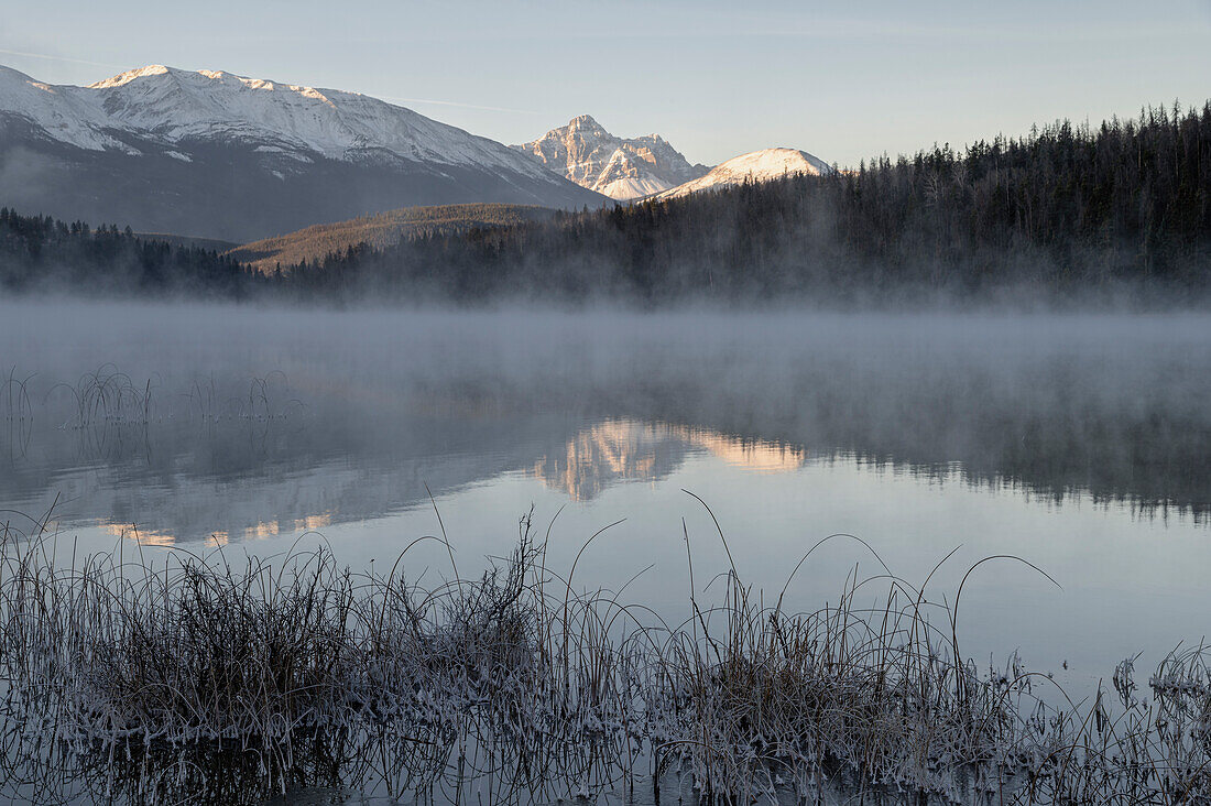 Mount Fitzwilliam at Pyramid Lake in Autumn with snow and morning mist, Jasper National Park, UNESCO World Heritage Site, Alberta, Canadian Rockies, Canada, North America