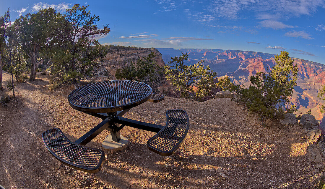 A metal picnic table along the rim trail overlooking Grand Canyon South Rim off of Hermit Road just west of Hopi Point, Grand Canyon, UNESCO World Heritage Site, Arizona, United States of America, North America