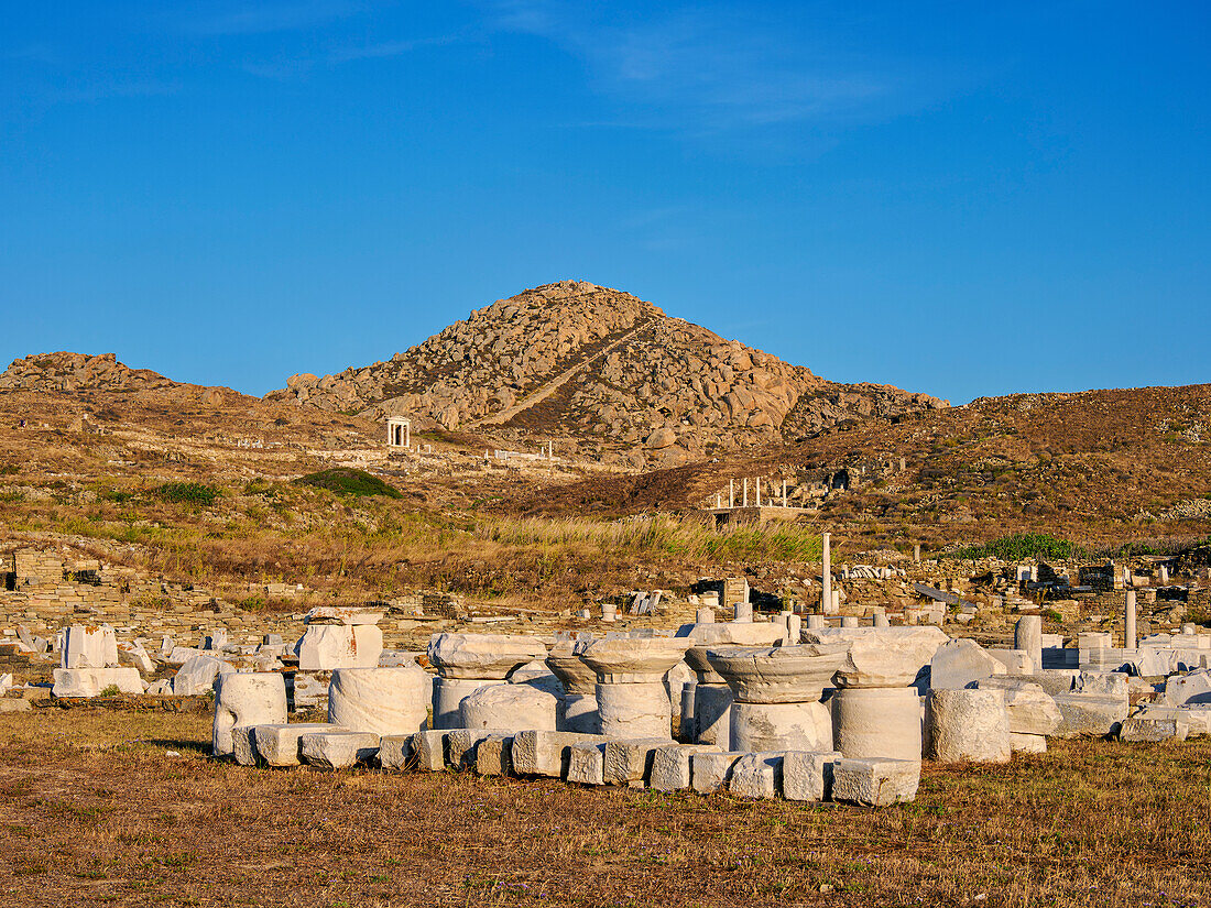 View towards the Mount Kynthos at sunset, Delos Archaeological Site, UNESCO World Heritage Site, Delos Island, Cyclades, Greek Islands, Greece, Europe