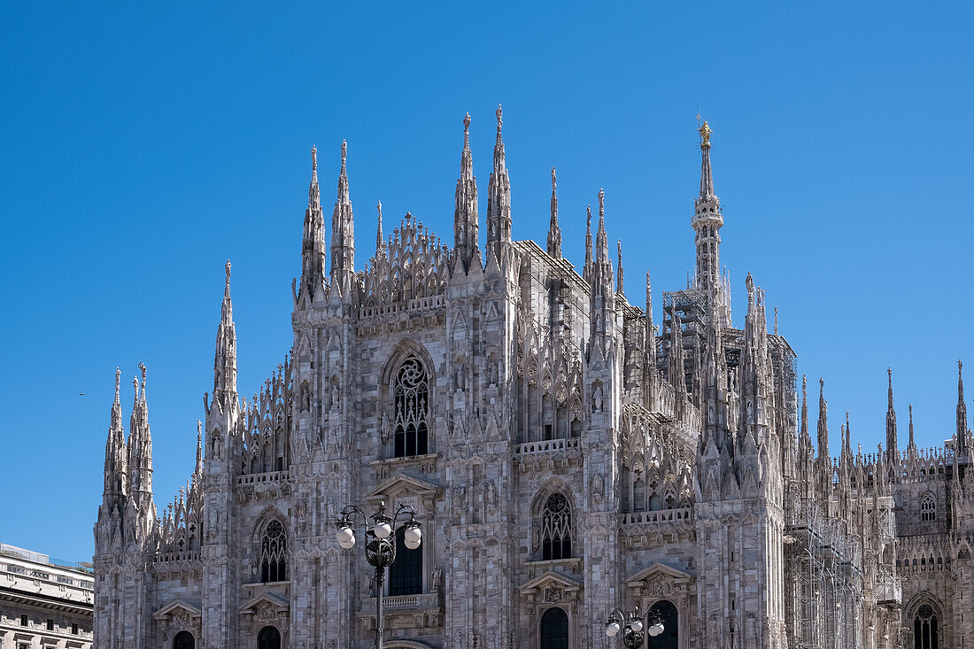 Facade of Milan Cathedral (Duomo di Milano), dedicated to the Nativity of St. Mary, seat of the Archbishop, Milan, Lombardy, Italy, Europe