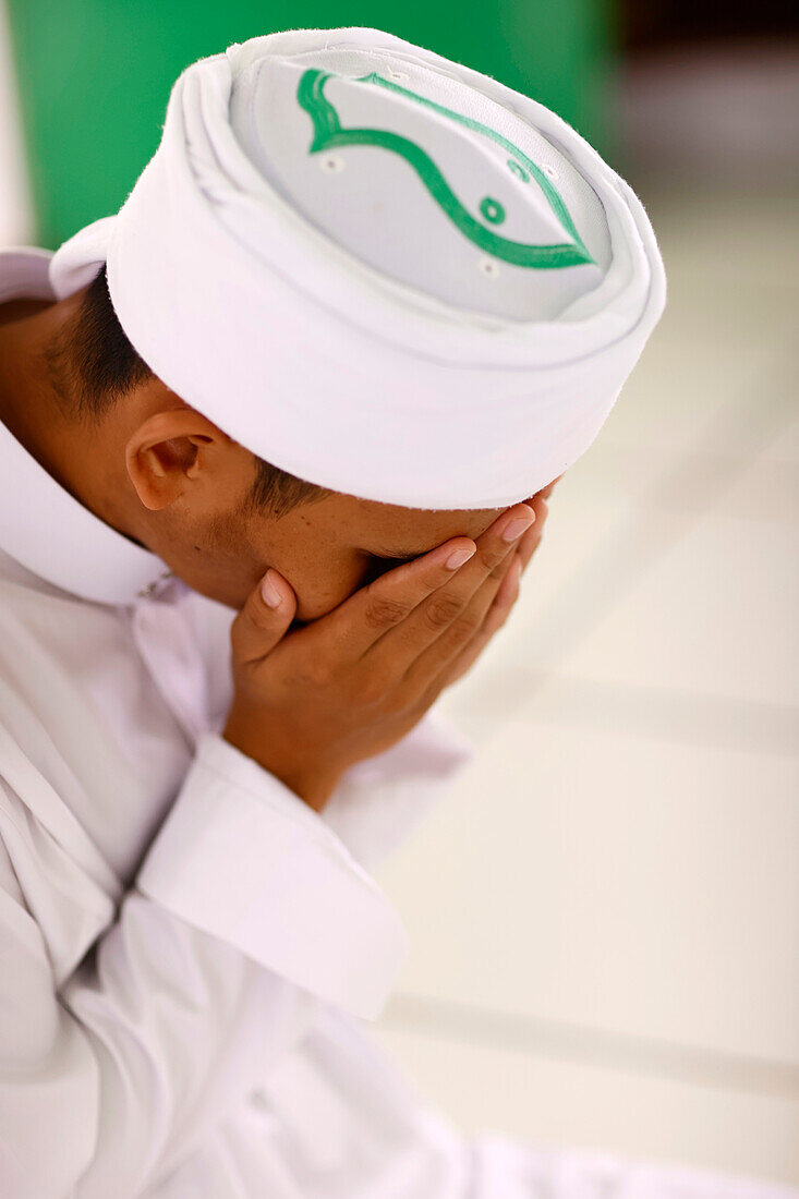 Muslim man praying, Jamiul Azhar Mosque, Vietnam, Indochina, Southeast Asia, Asia