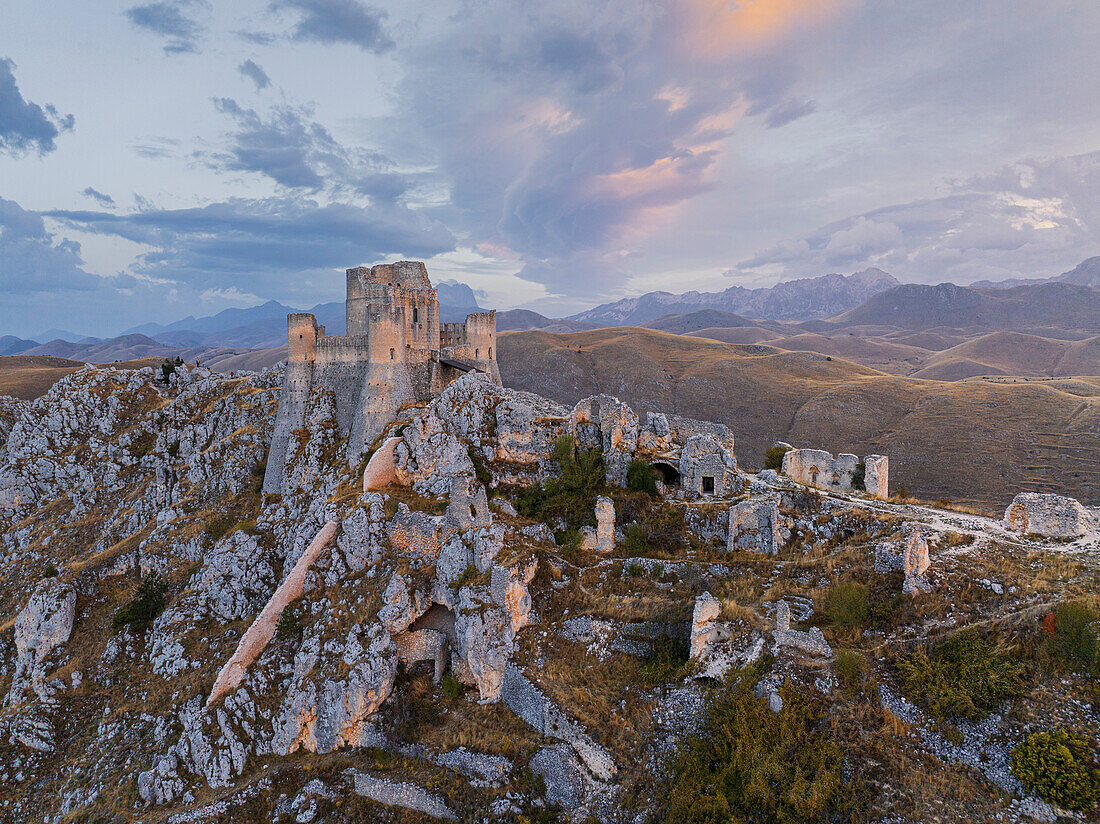 Aerial view taken by drone of Rocca Calascio castle during an autumn sunrise, National Park of Gran Sasso and Monti of Laga, Abruzzo, Italy, Europe