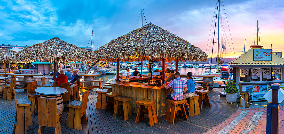 View of golden sunset, boats and restaurants at Knysna Waterfront, Knysna, Western Cape Province, South Africa, Africa