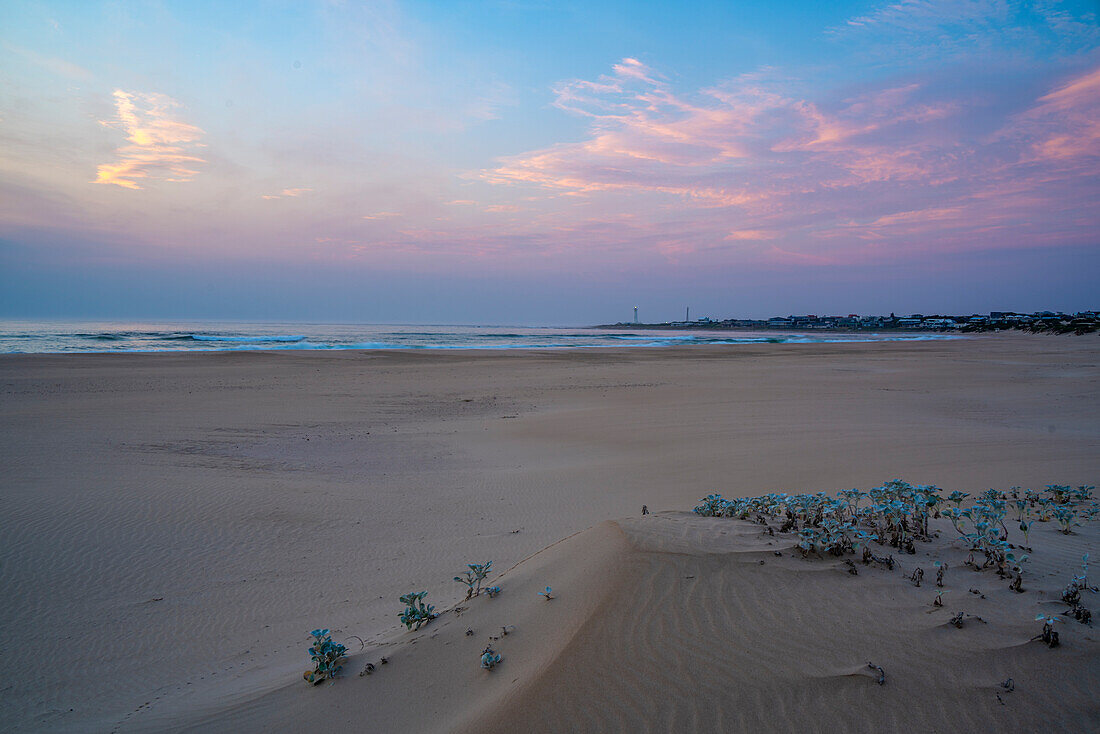 View of beach and Seal Point Lighthouse at sunrise, Cape St. Francis, Eastern Cape Province, South Africa, Africa