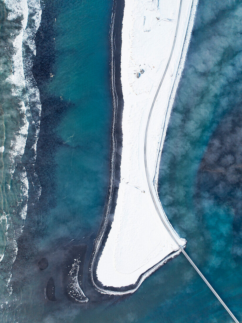 Aerial view by drone of the coastal road near to Selfoss during a cold winter day, Selfoss, Iceland, Polar Regions