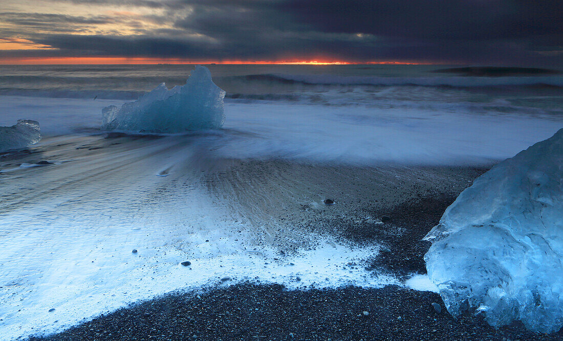 Breioamerkursandur (Diamond Beach) near Jokulsarlon Glacier Lagoon, at sunrise (dawn), Vatnajokull National Park, southern Iceland, Polar Regions