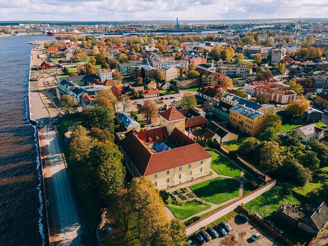 Aerial drone view of the Livonian Order Castle in Ventspils on the Venta River, Livonian Coast, Latvia, Baltic States, Europe