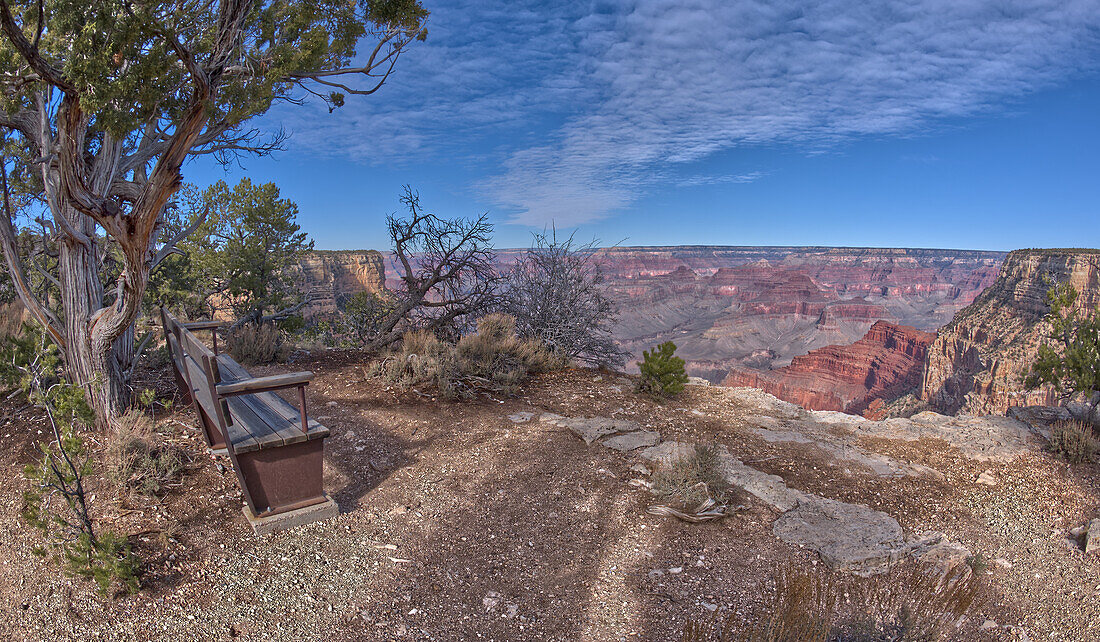 A bench along the rim trail overlooking Grand Canyon South Rim off Hermit Road halfway between Monument Creek Vista and The Abyss, Grand Canyon, Arizona, United States of America, North America