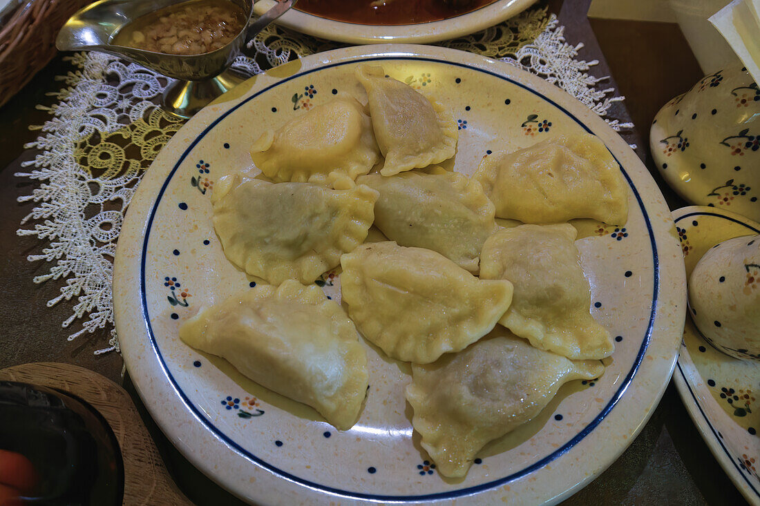 Traditional food dish with dumplings served in a tavern, Warsaw, Poland, Europe