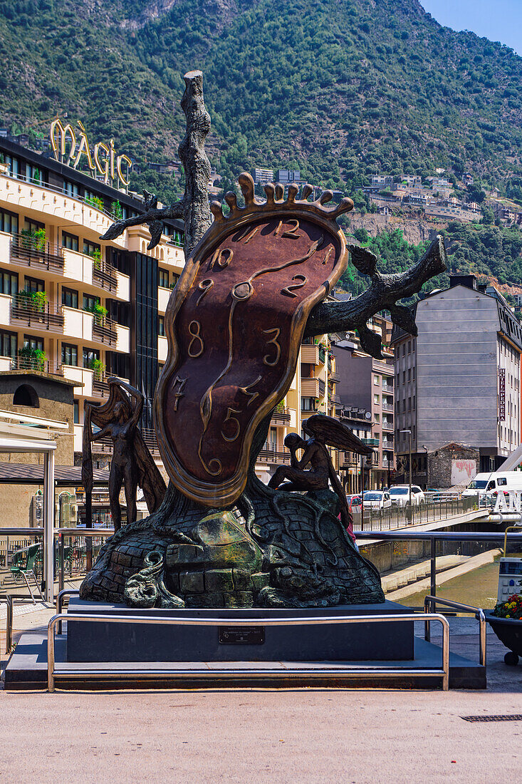 Noblesa del Temps, Salvador Dali bronze sculpture with melting clock in the capital, Andorra la Vella, Andorra, in the Pyrenees Mountains, Europe