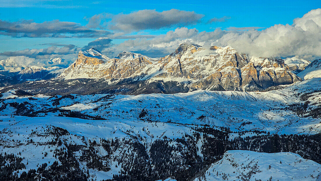 Rocky peaks and snow covered forest, Dolomites, Italy, Europe