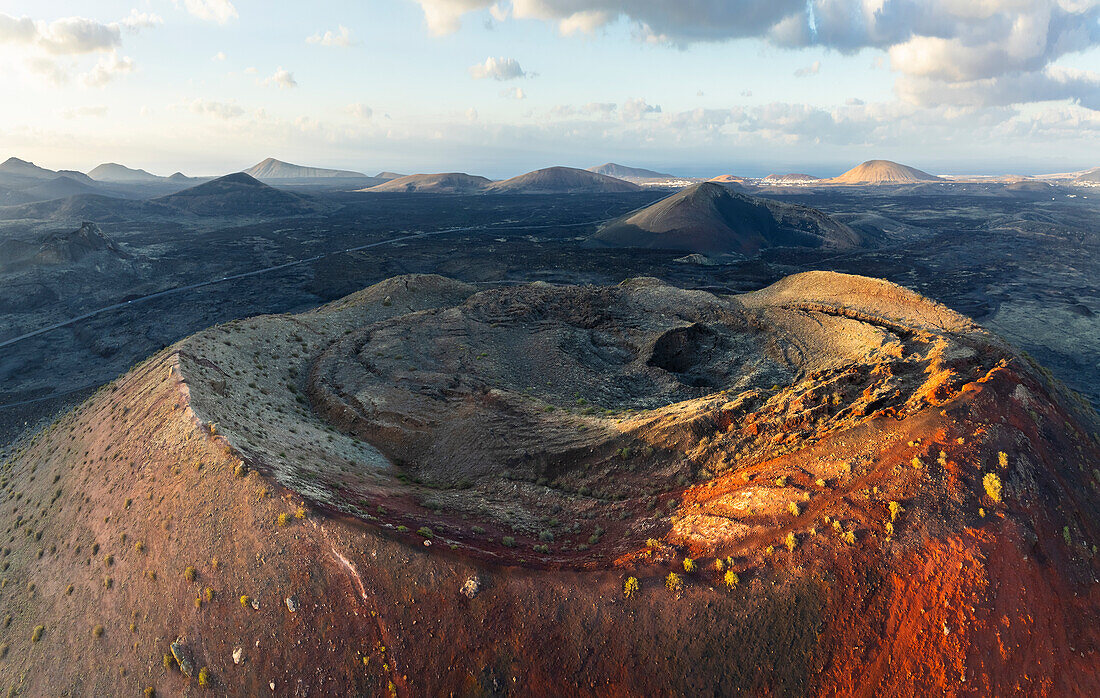 Aerial view of Caldera Colorada at sunset, Tinajo, Las Palmas, Lanzarote, Canary Islands, Spain, Atlantic, Europe