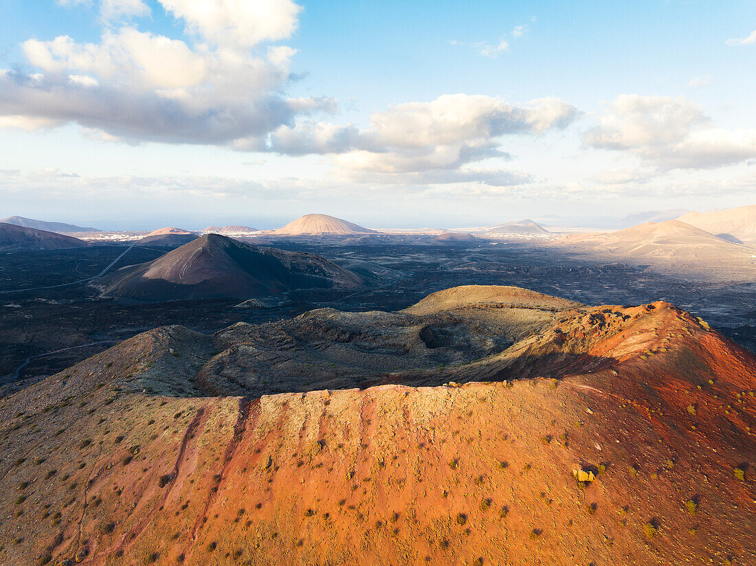 Aerial view of Caldera Colorada at sunset, Tinajo, Las Palmas, Lanzarote, Canary Islands, Spain, Atlantic, Europe