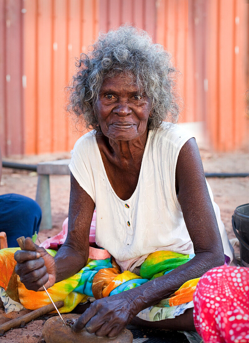 Portrait of a woman, an Aboriginal elder, at Nyinyikay Homeland, East Arnhem Land, Northern Territory, Australia, Pacific