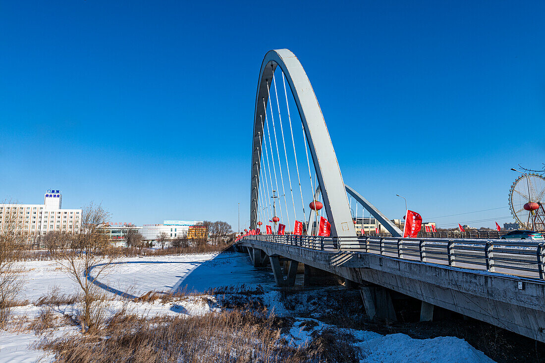 Bridge to Heihe island on the Amur river banks, Heihe, Heilongjiang, China, Asia